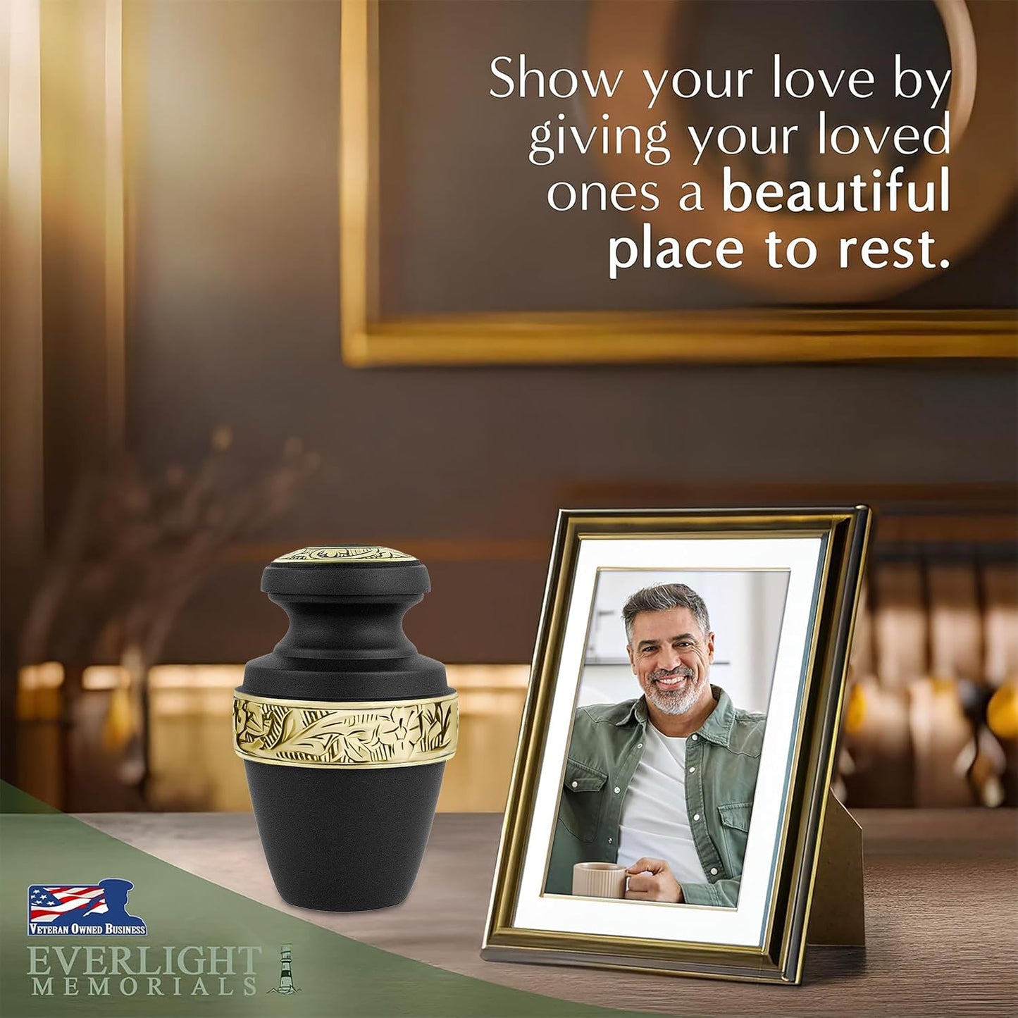 Classic Matte Black Small Keepsake Urn — displayed beside framed photo of loved one on wooden surface
