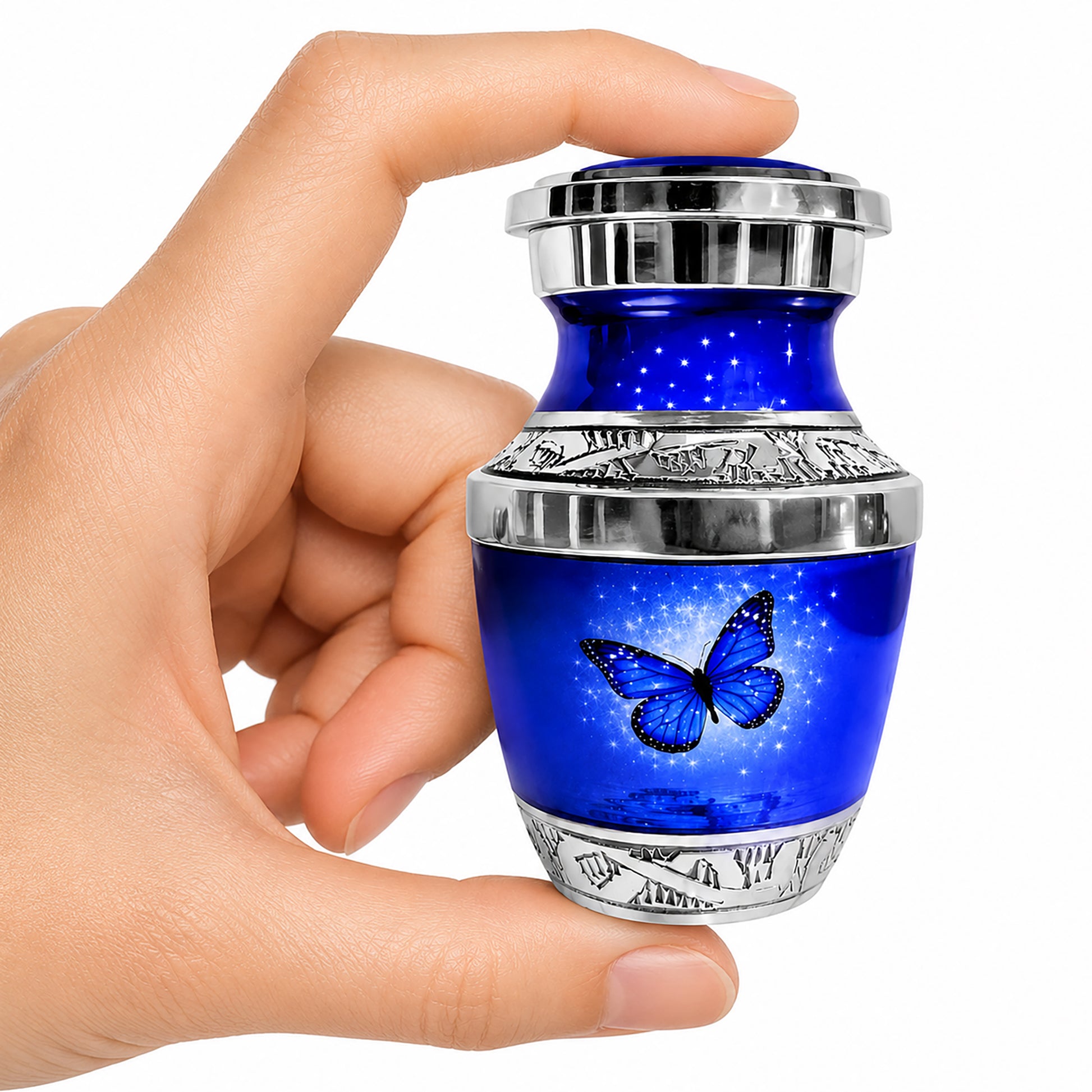 Dark Blue Butterfly Keepsake Cremation Urn held in hand — small sharing memorial urn for human ashes