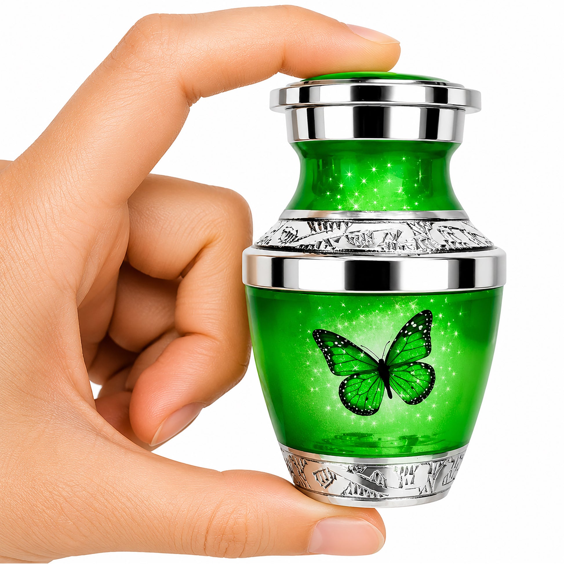Green Butterfly Keepsake Cremation Urn held in hand — small sharing memorial urn for human ashes