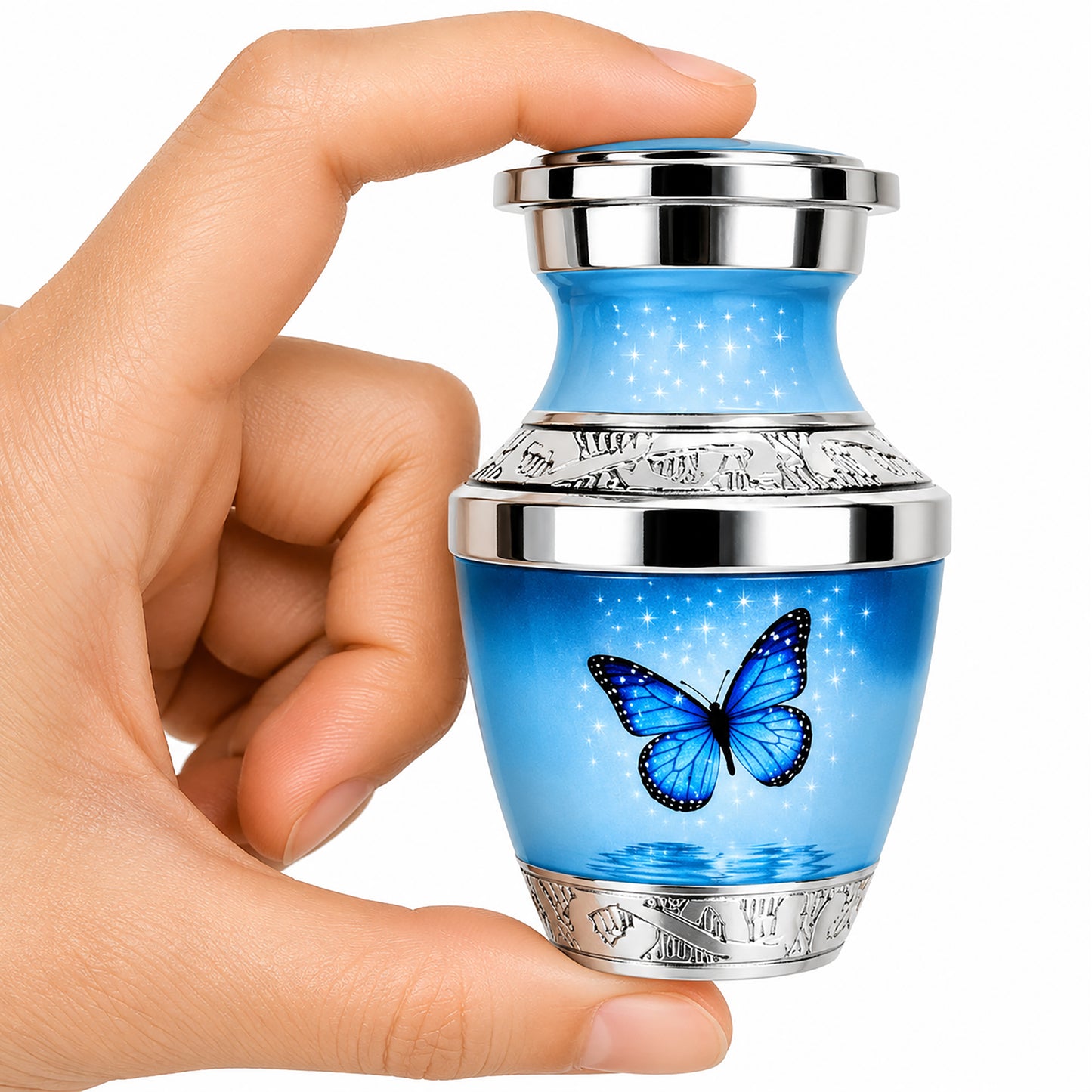 Light Blue Butterfly Keepsake Cremation Urn held in hand — small sharing memorial urn for human ashes