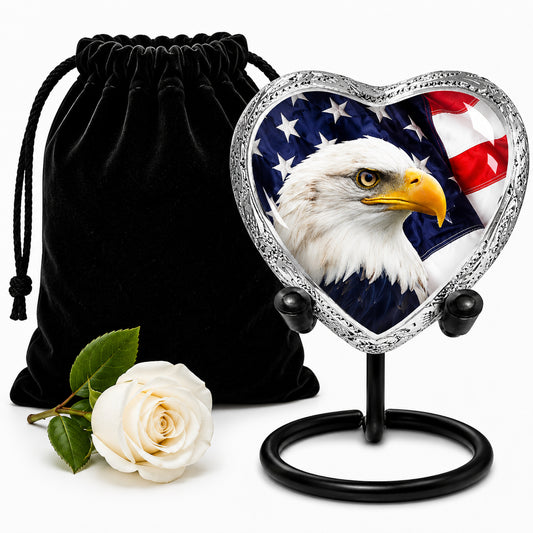 American Eagle Heart Keepsake Cremation Urn on display stand with black velvet bag and white rose — small patriotic memorial urn