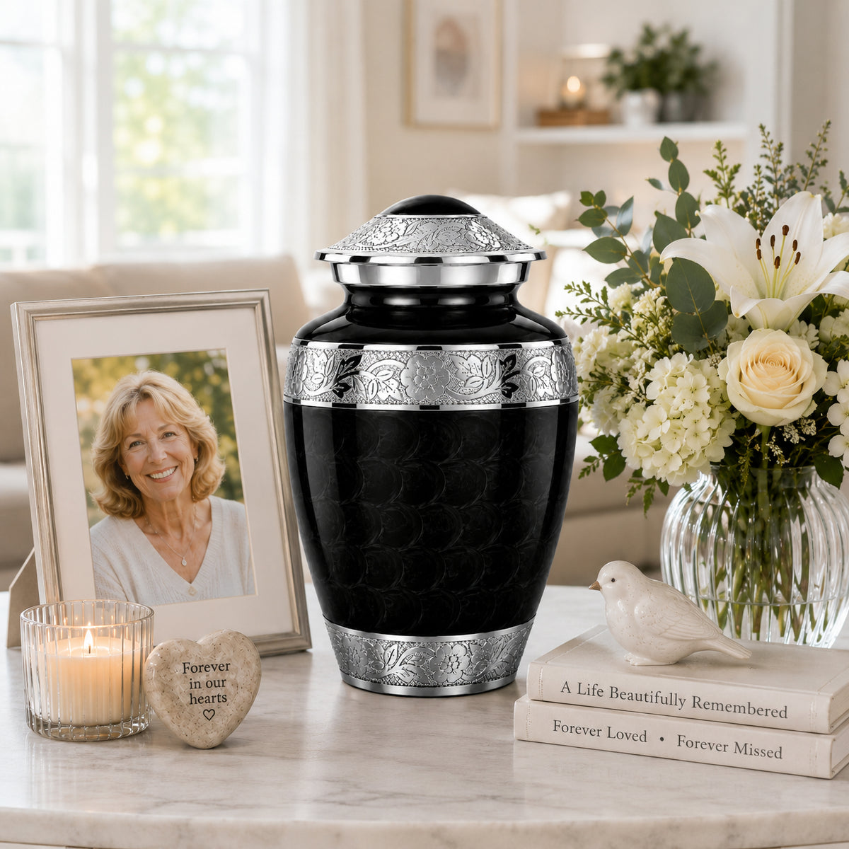 Black Forever After Cremation Urn displayed with white roses and photo frame in living room