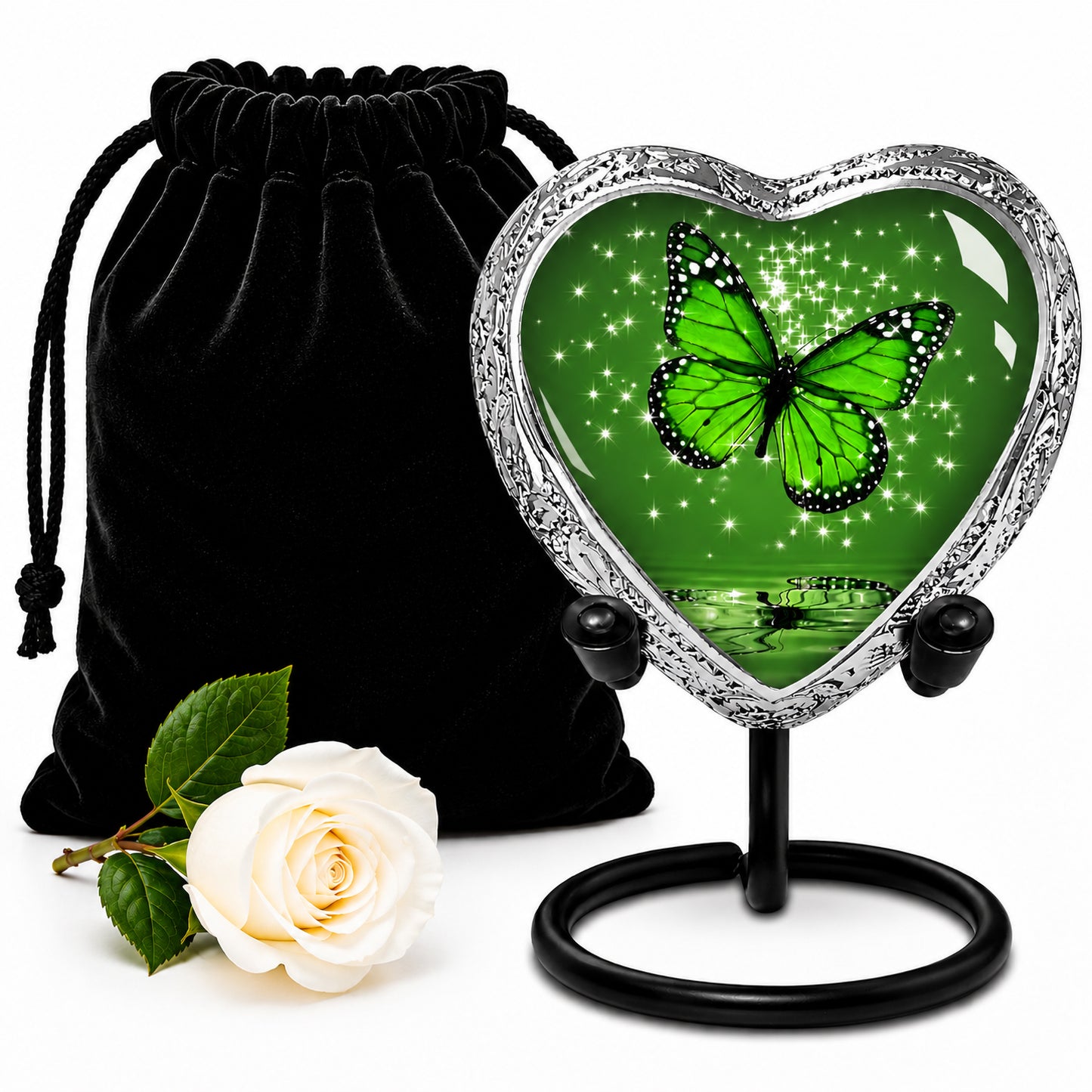 Green Butterfly Heart Keepsake Cremation Urn on display stand with black velvet bag and white rose — small sharing memorial urn for human ashes
