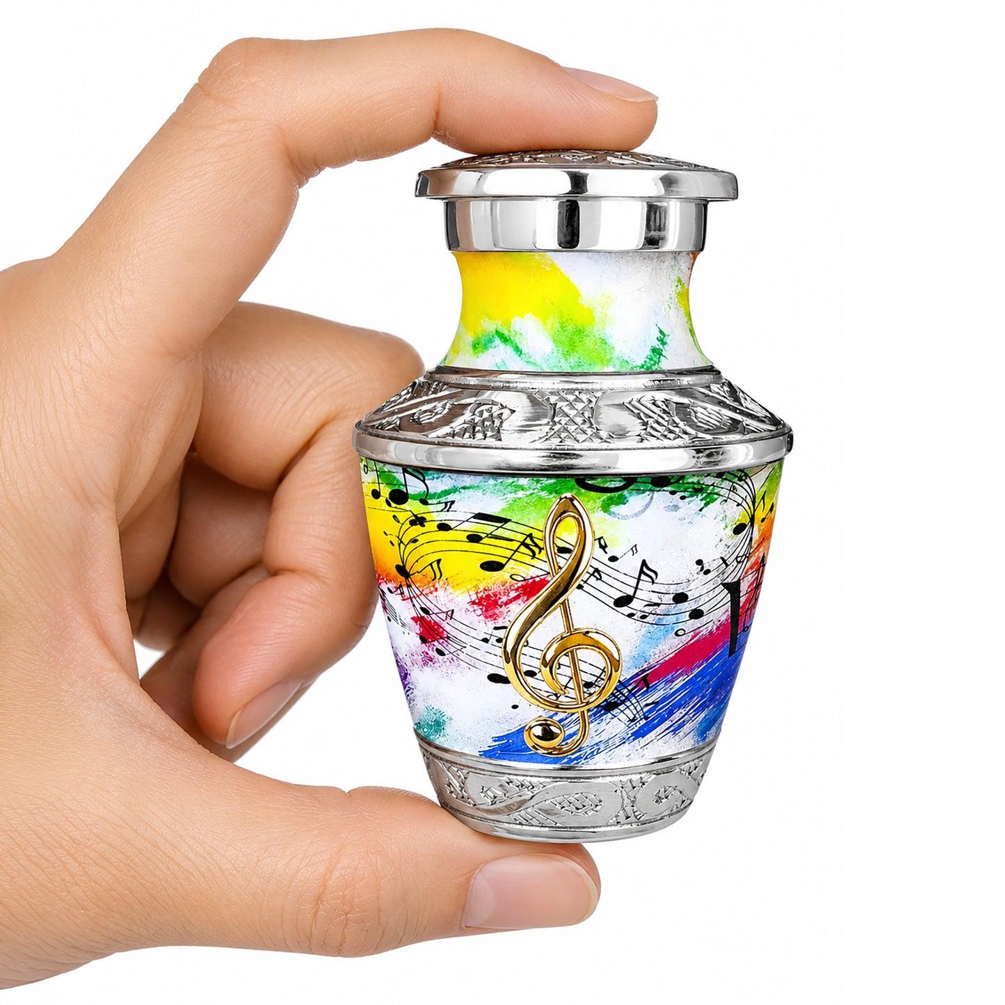 White and rainbow musical notes keepsake cremation urn held in hand showing small size on white background