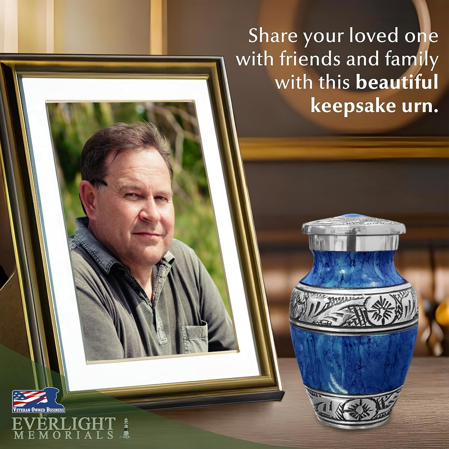 Dark blue watercolor keepsake urn beside framed photo of man on memorial table