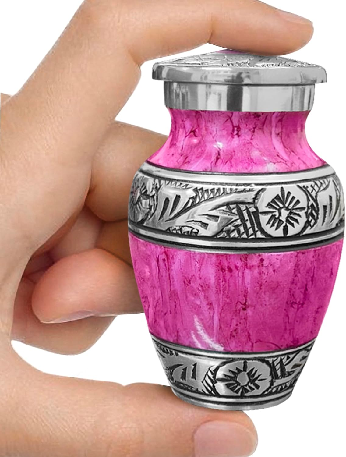 Purple watercolor keepsake urn held between fingers showing size